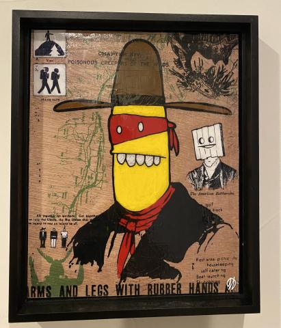 Mixed media painting on board depicting a cartoon cowboy with various smaller detailed images surrounding him